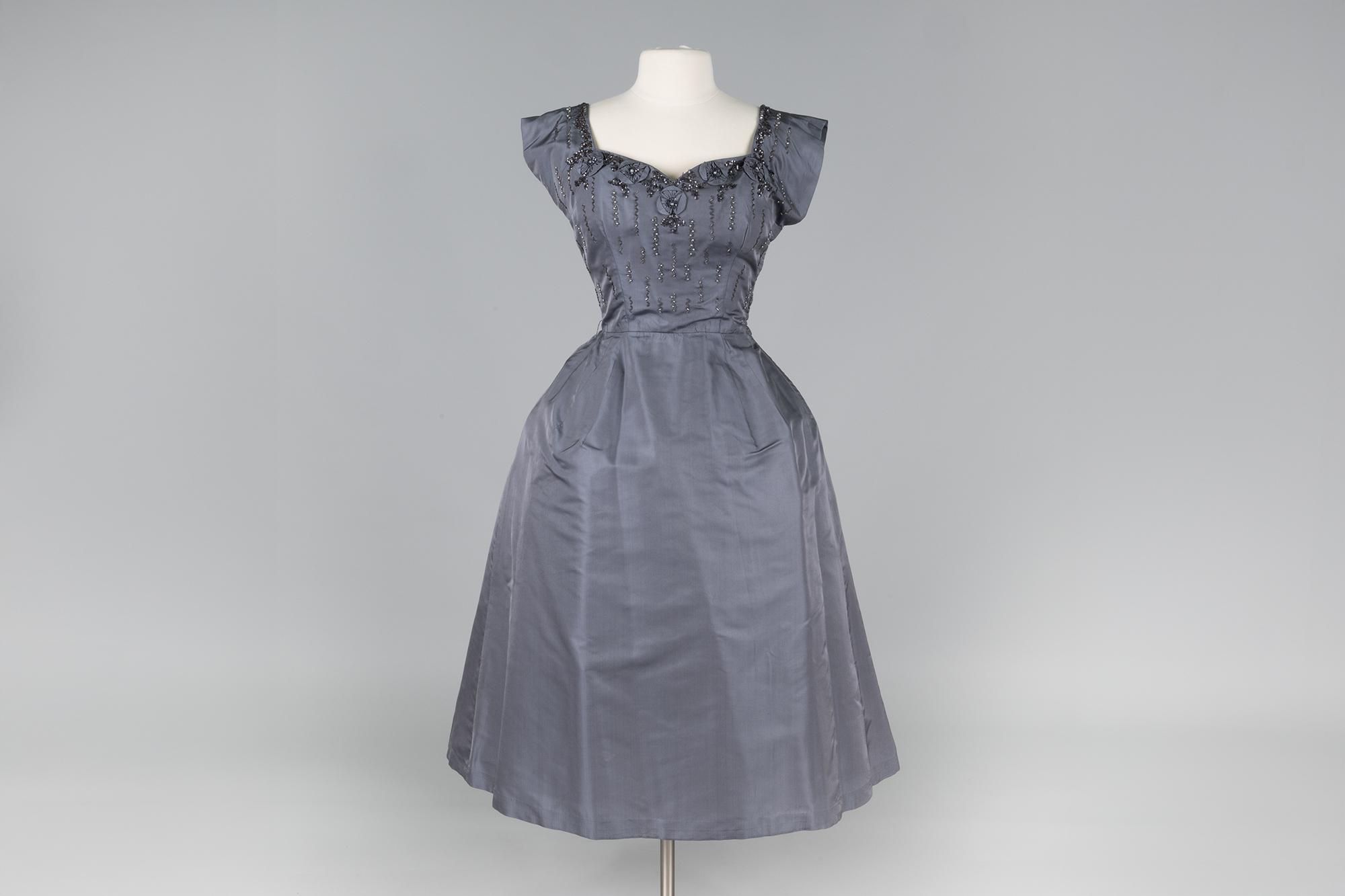 Image of Grey silk tea-length evening gown worn by Evelyn Baker Langlie, 1958